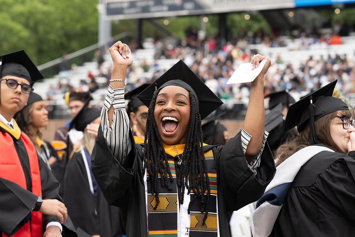 A graduate celebrates during Old Dominion University’s undergraduate Commencement exercise Saturday, 5月4日, 2024.